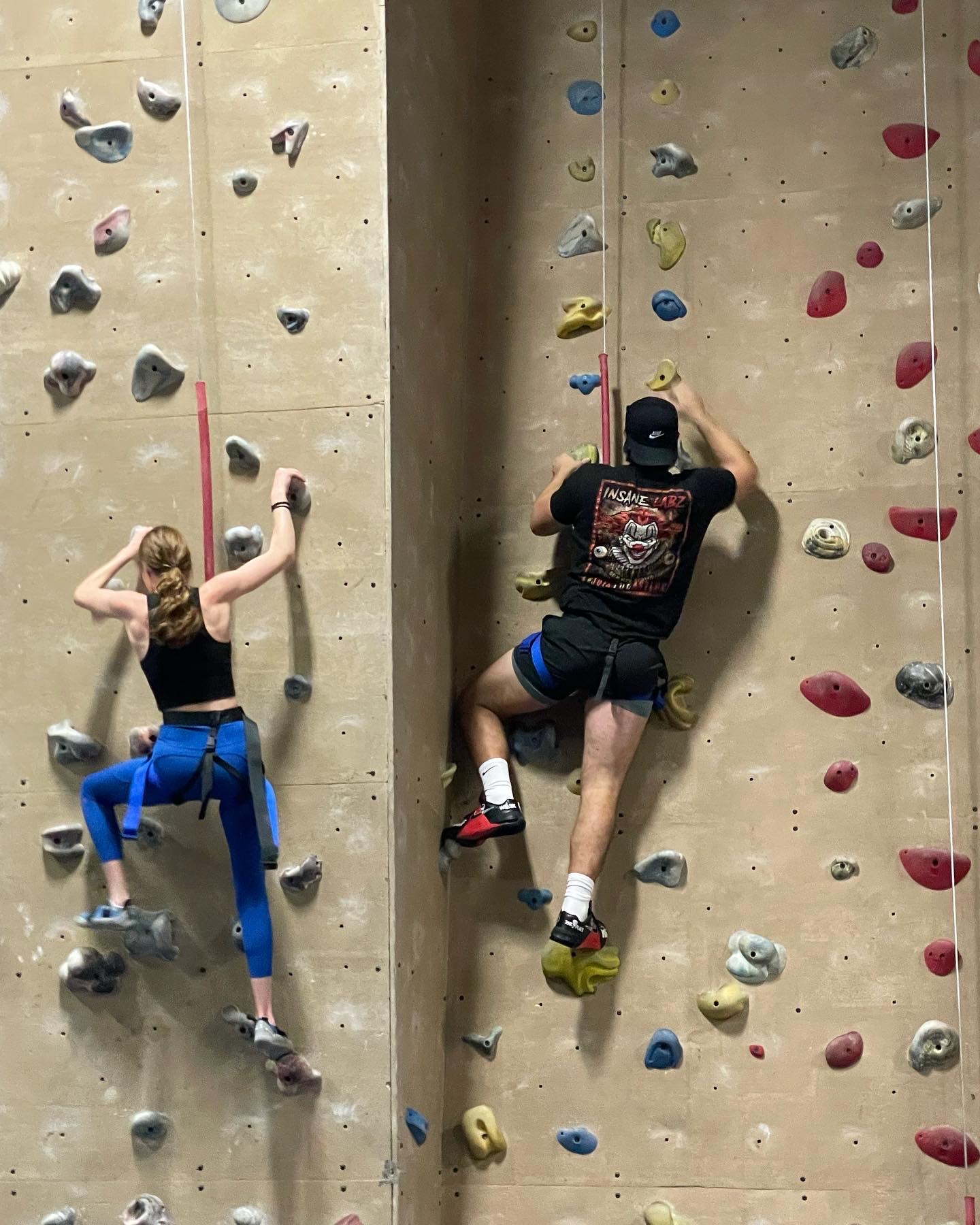 two climbers top roping